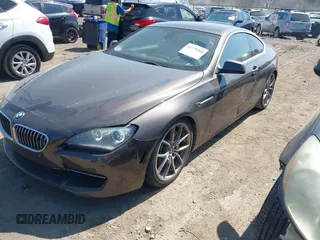 2012 BMW 6 Series 650i z VIN WBALX3C57CC528832, wystawiony jako IAAI lot #41779268 z przebiegiem 75 119 mil mil oraz . Historia ofert i sprzedaży dostępna na DreamBid. Obrazek 2.