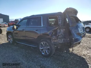 2015 Chevrolet Tahoe LTZ with VIN 1GNSKCKC4FR704080, listed as a Copart auction lot 78803094 with 156,992 mi miles and Salvage Title. Bid and sale history available at carsss.com. Image 2.