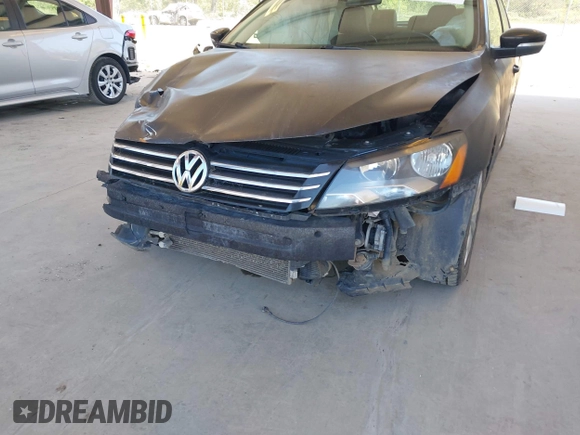 2015 Volkswagen Passat 1.8T Limited Edition with VIN 1VWAT7A36FC054484, listed as a IAAI auction lot 42078125 with 119,550 mi miles. Bid and sale history available at carsss.com. Image 6.