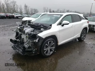 2016 Lexus RX 350 with VIN JTJBZMCAXG2003686, listed as a Copart auction lot 43204005 with 125,771 mi miles and Salvage Title. Bid and sale history available at DreamBid. Image 1.