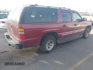 2003 Chevrolet Suburban LT z VIN 1GNFK16Z43J310271, wystawiony jako IAAI lot #41699310 z przebiegiem 232 680 mil mil oraz . Historia ofert i sprzedaży dostępna na DreamBid. Obrazek 4.