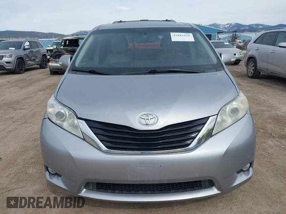 2014 Toyota Sienna Limited with VIN 5TDDK3DC7ES088938, listed as a IAAI auction lot 41885658 with 105,758 mi miles and . Bid and sale history available at DreamBid. Image 12.