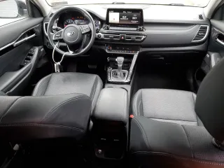 2021 Kia Seltos SX with VIN KNDETCA22M7116568, listed as a Copart auction lot 51619985 with 50,065 mi miles and Salvage Title. Bid and sale history available at carsss.com. Image 8.