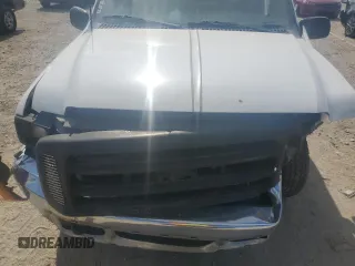 2000 Ford F-250 XL z VIN 1FTNF20L0YEA92980, wystawiony jako Copart lot #56422575 z przebiegiem 210 425 mil mil oraz Szkoda całkowita • Salvage title. Historia ofert i sprzedaży dostępna na DreamBid. Obrazek 11.