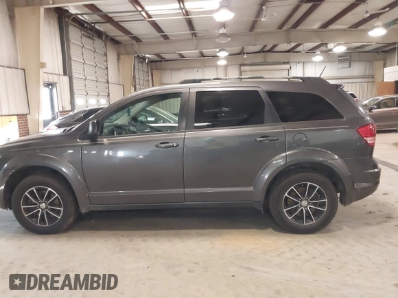 2017 Dodge Journey SE with VIN 3C4PDCAB2HT684231, listed as a IAAI auction lot 41189943 with 201,549 mi miles and . Bid and sale history available at DreamBid. Image 14.