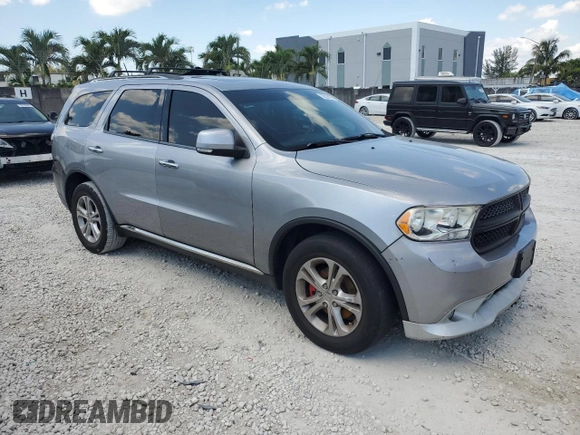 2013 Dodge Durango Crew z VIN 1C4RDJDGXDC696119, wystawiony jako Copart lot #58226905 z przebiegiem 154 915 mil mil oraz Czysty tytuł • Clean title. Historia ofert i sprzedaży dostępna na DreamBid. Obrazek 4.