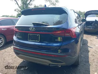 2021 Hyundai Santa Fe SE with VIN 5NMS1DAJXMH344025, listed as a IAAI auction lot 42477124 with 17,129 mi miles and . Bid and sale history available at DreamBid. Image 16.