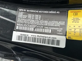 2012 BMW 6 Series 650i xDrive with VIN WBALX5C54CC894131, listed as a IAAI auction lot 42165498 with 82,800 mi miles. Bid and sale history available at carsss.com. Image 9.
