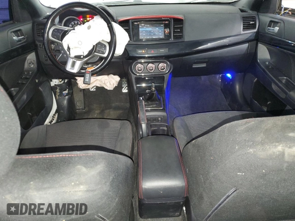 2015 Mitsubishi Lancer Evolution Final Edition z VIN JA32W7FV4FU028743, wystawiony jako Copart lot #75206334 z przebiegiem 51 409 mil mil oraz Szkody całkowita. Historia ofert i sprzedaży dostępna na DreamBid. Obrazek 8.