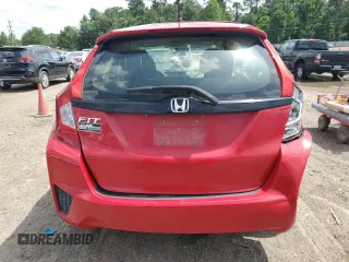 2016 Honda Fit LX with VIN JHMGK5H54GX010407, listed as a Copart auction lot 60127785 with 70,089 mi miles and Salvage title. Bid and sale history available at DreamBid. Image 6.