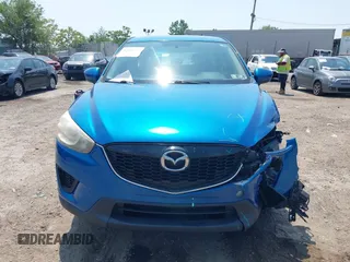 2014 Mazda CX-5 Sport z VIN JM3KE4BE4E0367444, wystawiony jako IAAI lot #42431272 z przebiegiem 181 191 mil mil oraz . Historia ofert i sprzedaży dostępna na DreamBid. Obrazek 12.