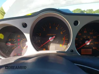 2003 Nissan 350Z Touring z VIN JN1AZ34E23T019866, wystawiony jako IAAI lot #41293510 z przebiegiem 118 416 mil mil oraz . Historia ofert i sprzedaży dostępna na DreamBid. Obrazek 7.