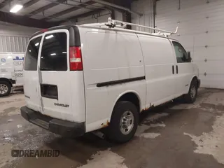 2004 Chevrolet Express Cargo Van with VIN 1GCGG25U641135906, listed as a IAAI auction lot 42038768 with 129,677 mi miles. Bid and sale history available at carsss.com. Image 4.