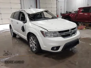 2014 Dodge Journey Limited with VIN 3C4PDCDG6ET151821, listed as a IAAI auction lot 41502752 with 151,280 mi miles and . Bid and sale history available at DreamBid. Image 1.