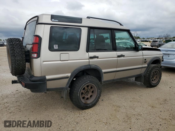 2002 Land Rover Discovery Cloth z VIN SALTY15482A752087, wystawiony jako Copart lot #69861824 z przebiegiem Nie podano mil oraz Szkoda całkowita • Salvage title. Historia ofert i sprzedaży dostępna na DreamBid. Obrazek 3.