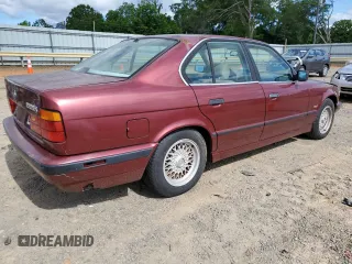 1995 BMW 5 Series 525i z VIN WBAHD632XSGK86387, wystawiony jako Copart lot #58245795 z przebiegiem 168 925 mil mil oraz Czysty tytuł • Clean title. Historia ofert i sprzedaży dostępna na DreamBid. Obrazek 3.