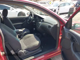 2003 Ford Focus ZX3 with VIN 3FAHP31323R119865, listed as a IAAI auction lot 42738163 with 64,008 mi miles and . Bid and sale history available at DreamBid. Image 5.