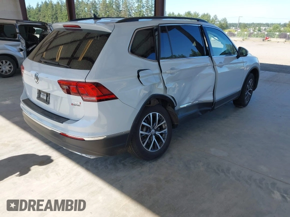 2018 Volkswagen Tiguan SEL z VIN 3VV2B7AX0JM197274, wystawiony jako IAAI lot #42392421 z przebiegiem 45 453 mil mil oraz . Historia ofert i sprzedaży dostępna na DreamBid. Obrazek 4.