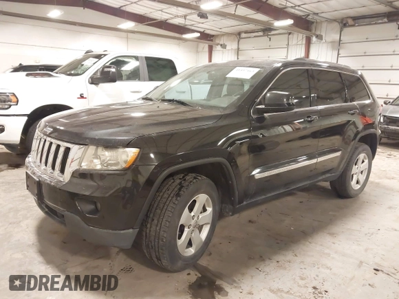2012 Jeep Grand Cherokee Laredo with VIN 1C4RJFAG6CC266144, listed as a IAAI auction lot 41497163 with 233,755 mi miles. Bid and sale history available at carsss.com. Image 2.