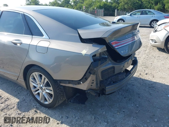 2016 Lincoln MKZ z VIN 3LN6L2G96GR601677, wystawiony jako IAAI lot #42647759 z przebiegiem 87 283 mil mil oraz . Historia ofert i sprzedaży dostępna na DreamBid. Obrazek 14.