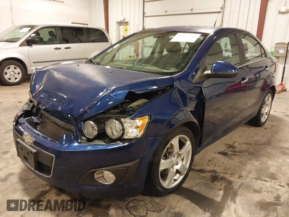 2012 Chevrolet Sonic LTZ z VIN 1G1JE5SB4C4214450, wystawiony jako IAAI lot #42207345 z przebiegiem 120 152 mil mil oraz . Historia ofert i sprzedaży dostępna na DreamBid. Obrazek 20.