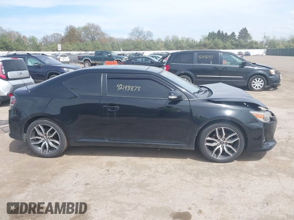 2015 Scion tC z VIN JTKJF5C75FJ012021, wystawiony jako IAAI lot #42143878 z przebiegiem 127 235 mil mil oraz . Historia ofert i sprzedaży dostępna na DreamBid. Obrazek 12.