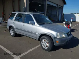 2001 Honda CR-V EX with VIN JHLRD18671C013132, listed as a IAAI auction lot 42057704 with 261,635 mi miles. Bid and sale history available at carsss.com. Image 1.