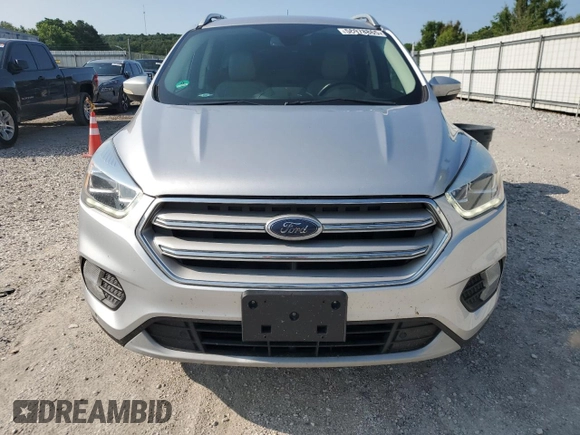 2018 Ford Escape Titanium z VIN 1FMCU0J95JUD44086, wystawiony jako Copart lot #58978865 z przebiegiem 90 874 mil mil oraz Szkoda całkowita • Salvage title. Historia ofert i sprzedaży dostępna na DreamBid. Obrazek 5.