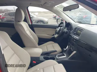 2015 Mazda CX-5 Touring with VIN JM3KE2CY7F0533731, listed as a IAAI auction lot 41876211 with 1 mi miles. Bid and sale history available at carsss.com. Image 5.