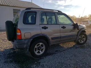 2002 Chevrolet Tracker ZR2 with VIN 2CNBJ734826902012, listed as a Copart auction lot 79226854 with 80,460 mi miles and Salvage title. Bid and sale history available at DreamBid. Image 3.