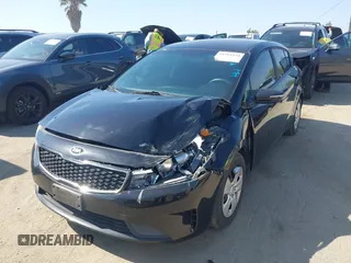 2017 Kia Forte LX with VIN KNAFK5A87H5696373, listed as a IAAI auction lot 41981938 with 63,181 mi miles and . Bid and sale history available at carsss.com. Image 2.