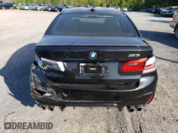 2018 BMW M5 z VIN WBSJF0C5XJB282107, wystawiony jako Copart lot #49979943 z przebiegiem 55 243 mil mil oraz . Historia ofert i sprzedaży dostępna na DreamBid. Obrazek 6.