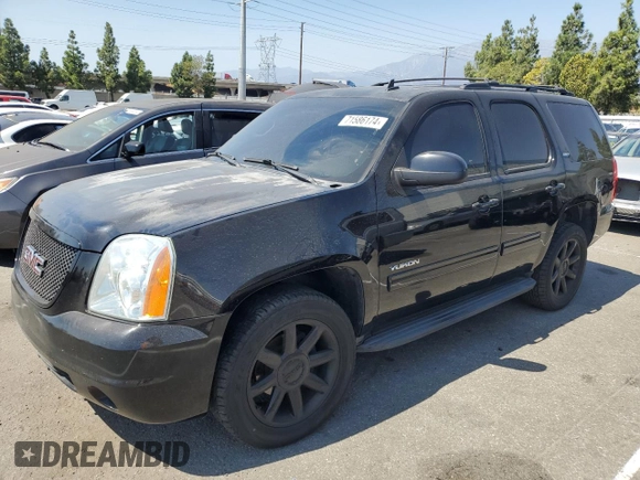 2013 GMC Yukon SLT with VIN 1GKS1CE06DR162852, listed as a Copart auction lot 71586174 with 182,169 mi miles and Salvage Title. Bid and sale history available at carsss.com. Image 1.