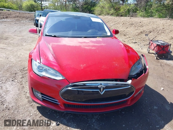 2014 Tesla Model S 60 with VIN 5YJSA1H11EFP37791, listed as a IAAI auction lot 41995504 with 84,371 mi miles and . Bid and sale history available at DreamBid. Image 12.