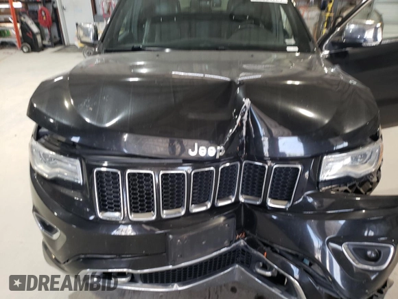 2015 Jeep Grand Cherokee Overland with VIN 1C4RJFCG0FC783375, listed as a Copart auction lot 61966725 with 191,478 mi miles and Salvage title. Bid and sale history available at DreamBid. Image 12.