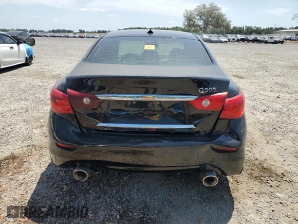 2015 Infiniti Q50 Premium z VIN JN1BV7AP7FM340202, wystawiony jako Copart lot #52777575 z przebiegiem 70 023 mil mil oraz Szkoda całkowita • Salvage title. Historia ofert i sprzedaży dostępna na DreamBid. Obrazek 6.