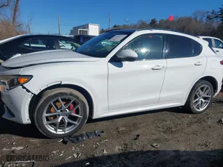 2020 Alfa Romeo Stelvio Ti with VIN ZASPAKBNXL7C91738, listed as a IAAI auction lot 41615757 with 1 mi miles. Bid and sale history available at carsss.com. Image 14.