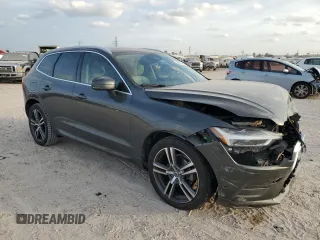 2018 Volvo XC60 Momentum with VIN LYV102RK0JB106389, listed as a Copart auction lot 82677454 with 114,832 mi miles and Salvage Title. Bid and sale history available at carsss.com. Image 4.