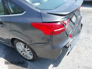 2018 Ford Focus Titanium с VIN 1FADP3J22JL314642, выставлен на аукционе IAAI как лот 42128194 с пробегом 62 787 миль миль и . История ставок и продаж доступна на DreamBid. Изображение 21.