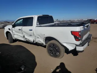 2021 Nissan Titan XD SV with VIN 1N6AA1FB0MN517885, listed as a Copart auction lot 77046004 with 52,284 mi miles and Salvage Title. Bid and sale history available at carsss.com. Image 2.