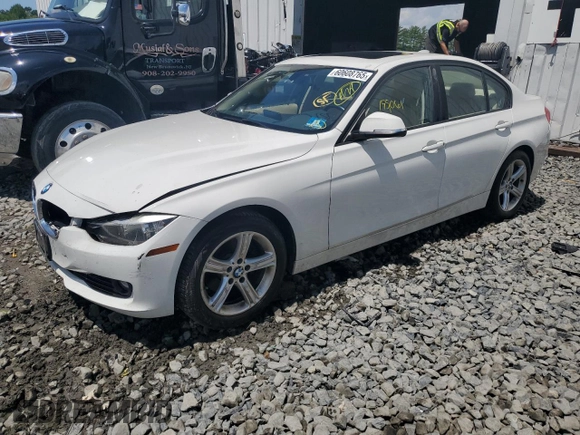2014 BMW 3 Series 320i xDrive with VIN WBA3C3C51EF983592, listed as a Copart auction lot 60608765 with 195,061 mi miles and Salvage title. Bid and sale history available at DreamBid. Image 1.
