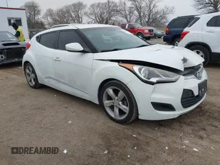 2014 Hyundai Veloster with VIN KMHTC6AD6EU211479, listed as a IAAI auction lot 41196275 with 132,337 mi miles. Bid and sale history available at carsss.com. Image 1.