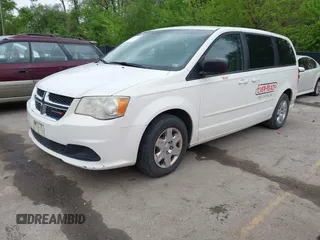 2013 Dodge Grand Caravan SE with VIN 2C4RDGBG8DR505844, listed as a IAAI auction lot 42139152 with 206,399 mi miles and . Bid and sale history available at DreamBid. Image 2.