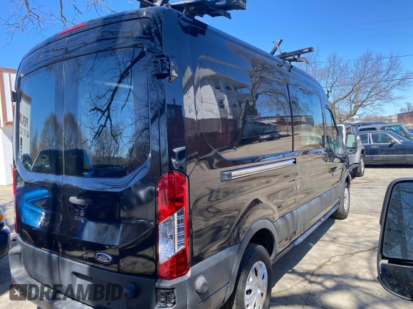 2015 Ford Transit Cargo with VIN 1FTNR2CMLFKA14542, listed as a Copart auction lot 52863735 with 134,970 mi miles and Clean title. Bid and sale history available at DreamBid. Image 4.