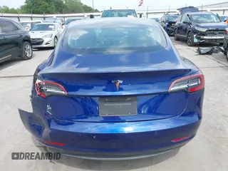2019 Tesla Model 3 Mid Range with VIN 5YJ3E1EA5KF190453, listed as a IAAI auction lot 41880684 with 58,909 mi miles and . Bid and sale history available at carsss.com. Image 17.