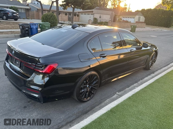 2022 BMW 7 Series 750i xDrive with VIN WBA7U2C02NCH89848, listed as a Copart auction lot 84766184 with 19,758 mi miles and Salvage title. Bid and sale history available at DreamBid. Image 4.