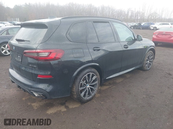 2023 BMW X5 xDrive40i with VIN 5UXCR6C01P9S01895, listed as a IAAI auction lot 41905192 with 33,326 mi miles and . Bid and sale history available at DreamBid. Image 4.