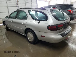 1999 Mercury Sable z VIN 1MEFM58S6XA647250, wystawiony jako Copart lot #83479674 z przebiegiem 166 550 mil mil oraz Szkody całkowita. Historia ofert i sprzedaży dostępna na DreamBid. Obrazek 2.