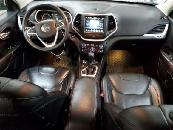 2015 Jeep Cherokee Trailhawk z VIN 1C4PJMBS0FW598694, wystawiony jako Copart lot #60731615 z przebiegiem 130 219 mil mil oraz Czysty tytuł • Clean title. Historia ofert i sprzedaży dostępna na DreamBid. Obrazek 8.