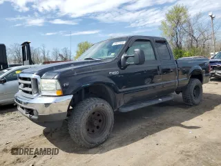 2002 Ford Super Duty F-250 XL with VIN 1FTNX21L32EA33392, listed as a Copart auction lot 49877554 with 0 mi miles and Salvage Title. Bid and sale history available at carsss.com. Image 1.
